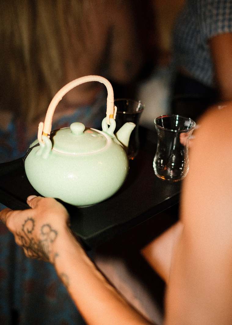 A jade teapot on a tray